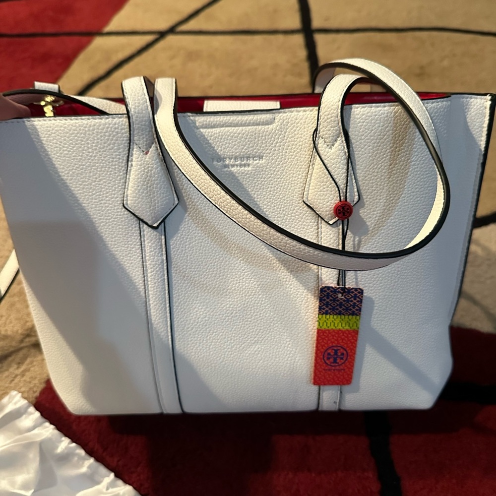 Brand new Tory purse got as a gift never used. Has a serial number.